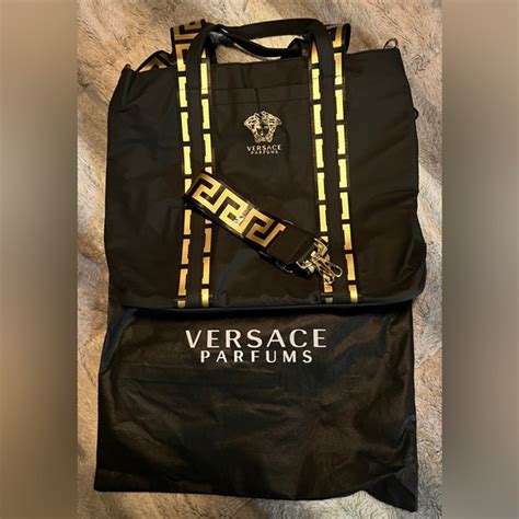 versace perfume with purse|Versace aftershave with bag.